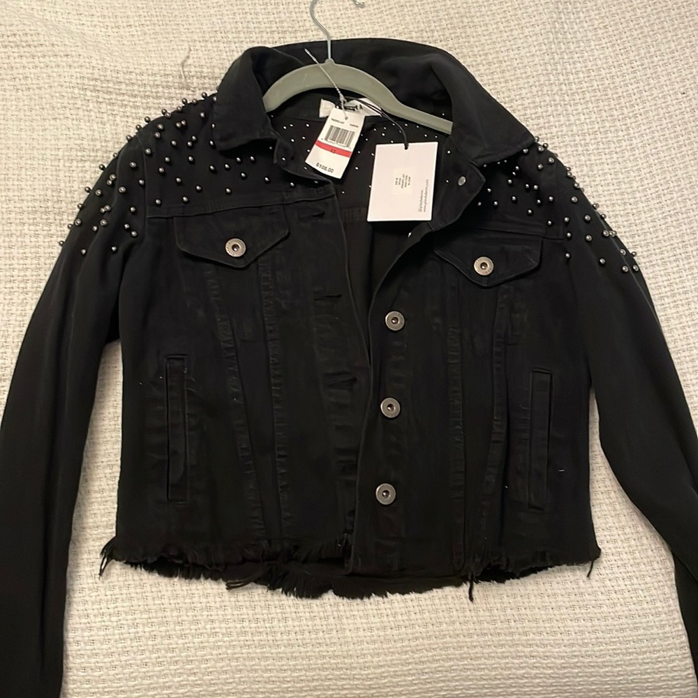 Black denim jacket with grey studs